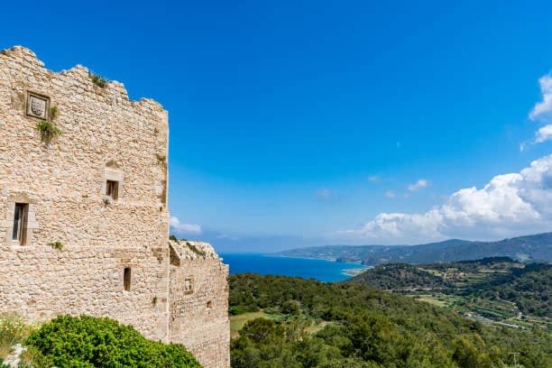 Kritinia Castle on its crag above the western coast