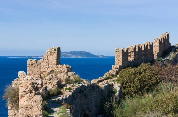 Kritinia Castle on its crag above the western coast