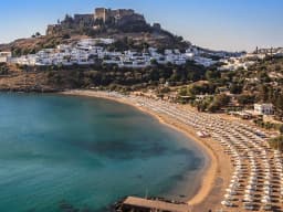 Lindos bay and beach below the village and acropolis